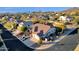 Aerial view of house and community, mountain views at 7920 E Sierra Morena E Cir, Mesa, AZ 85207