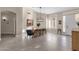 Bright dining room with a modern chandelier and hardwood floors at 7920 E Sierra Morena E Cir, Mesa, AZ 85207