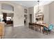 Bright dining room with a modern chandelier and hardwood floors at 7920 E Sierra Morena E Cir, Mesa, AZ 85207