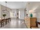 Bright dining room with a modern chandelier and hardwood floors at 7920 E Sierra Morena E Cir, Mesa, AZ 85207