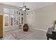 Bright living room with large windows and plantation shutters at 7920 E Sierra Morena E Cir, Mesa, AZ 85207