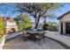 Outdoor patio with seating area, fireplace, and stone design at 7920 E Sierra Morena E Cir, Mesa, AZ 85207