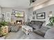 Bright living room featuring a fireplace and ample seating at 8149 W Daley Ln, Peoria, AZ 85383