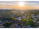 Aerial view of community with sunset in background at 8235 E Glenrosa Ave, Scottsdale, AZ 85251