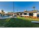 Spacious backyard with pool, spa, and grassy area at 8235 E Glenrosa Ave, Scottsdale, AZ 85251