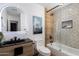 Modern bathroom with a walk-in shower, updated vanity, and stylish tile at 8235 E Glenrosa Ave, Scottsdale, AZ 85251