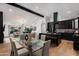 Open dining area with glass table and kitchen views at 8235 E Glenrosa Ave, Scottsdale, AZ 85251