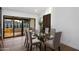 Bright dining area with glass table and comfortable seating at 8235 E Glenrosa Ave, Scottsdale, AZ 85251