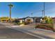 Modern home exterior with a wooden fence and landscaping at 8235 E Glenrosa Ave, Scottsdale, AZ 85251