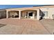 Spacious backyard with covered patio and hot tub at 9561 W Debbie Pl, Arizona City, AZ 85123