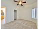 Spacious bedroom with a view of the kitchen and a large closet at 9561 W Debbie Pl, Arizona City, AZ 85123