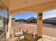 Covered patio with view of backyard at 9561 W Debbie Pl, Arizona City, AZ 85123