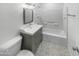 Clean bathroom with a gray vanity and updated fixtures at 9610 N 4Th Ave, Phoenix, AZ 85021