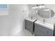 Modern bathroom with double vanity and updated fixtures at 9610 N 4Th Ave, Phoenix, AZ 85021