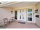 Front entry with double doors and welcoming patio at 9729 W Pinecrest Dr, Sun City, AZ 85351