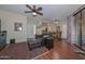 Living room with hardwood floors and ceiling fan at 1001 N Pasadena -- # 128, Mesa, AZ 85201