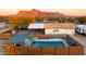 Inviting pool with patio furniture and mountain views at 1011 N Vista Rd, Apache Junction, AZ 85119