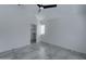 Bedroom with grey flooring, a large window, and a closet at 10115 E Mountain View Rd # 2022, Scottsdale, AZ 85258