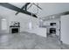 Open concept living room with kitchen, fireplace, and high ceilings at 10115 E Mountain View Rd # 2022, Scottsdale, AZ 85258