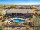 Aerial view of a home with a pool and spa at 12159 N 120Th Way, Scottsdale, AZ 85259