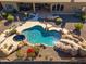 Stunning aerial view of the home and its resort-style backyard at 12159 N 120Th Way, Scottsdale, AZ 85259