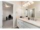 Double vanity bathroom with a view into another room at 12159 N 120Th Way, Scottsdale, AZ 85259