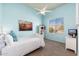 Light and airy bedroom with a twin bed and window coverings at 12159 N 120Th Way, Scottsdale, AZ 85259