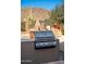 High-end outdoor kitchen with a built-in grill at 12159 N 120Th Way, Scottsdale, AZ 85259