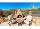 Cozy fire pit area with comfortable seating for relaxation at 12159 N 120Th Way, Scottsdale, AZ 85259
