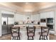 Modern kitchen with white cabinets, granite counters, and stainless steel appliances at 12159 N 120Th Way, Scottsdale, AZ 85259