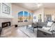 Spacious living room with fireplace and mountain views at 12159 N 120Th Way, Scottsdale, AZ 85259