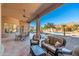 Covered patio with seating area and pool view at 12159 N 120Th Way, Scottsdale, AZ 85259