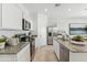 Modern kitchen with stainless steel appliances and granite countertops at 1216 S Mullberry St, Florence, AZ 85132