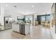 Open concept kitchen with island and stainless steel appliances at 1216 S Mullberry St, Florence, AZ 85132