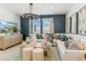 Spacious living room with comfortable seating and large windows at 1216 S Mullberry St, Florence, AZ 85132