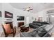 Spacious living room featuring a fireplace and ample seating at 12701 W Avalon Dr, Avondale, AZ 85392