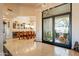 Spacious foyer leads to dining area and boasts a clear view into the front courtyard at 13412 N 14Th Pl, Phoenix, AZ 85022