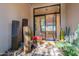 Beautiful foyer featuring unique water feature, plants, and glass front door at 13412 N 14Th Pl, Phoenix, AZ 85022