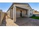Private backyard patio with brick pavers and artificial turf at 13648 W Desert Glen Dr, Sun City West, AZ 85375