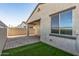 Artificial turf and a wall for privacy in the backyard at 13648 W Desert Glen Dr, Sun City West, AZ 85375