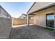 Private backyard patio with pavers and artificial turf at 13648 W Desert Glen Dr, Sun City West, AZ 85375