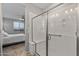 Bathroom with a large walk in shower and bench at 13648 W Desert Glen Dr, Sun City West, AZ 85375