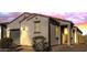 Stunning stucco home with a Spanish-style tile roof and landscaped yard at 13648 W Desert Glen Dr, Sun City West, AZ 85375