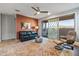 Spacious living area with sliding glass doors leading to a patio at 13648 W Desert Glen Dr, Sun City West, AZ 85375