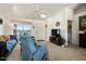 Bright and airy living room with ample natural light at 15442 S Tipton Pl, Arizona City, AZ 85123