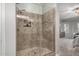 Large walk-in shower with glass enclosure and tile surround at 16244 W Cheery Lynn Rd, Goodyear, AZ 85395