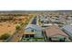 Aerial view of the home in a well-maintained community with desert landscaping at 17706 W Villa Chula Ln, Surprise, AZ 85387