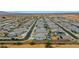 An aerial shot showcases the well-planned community and the position of the featured home at 17706 W Villa Chula Ln, Surprise, AZ 85387