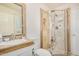 Well-appointed bathroom features a stone vanity, glass-enclosed shower, and modern fixtures at 1815 N 74Th St, Scottsdale, AZ 85257