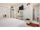 Clean bedroom with TV, walk-in closet and a dressing area perfect for getting ready at 1815 N 74Th St, Scottsdale, AZ 85257
